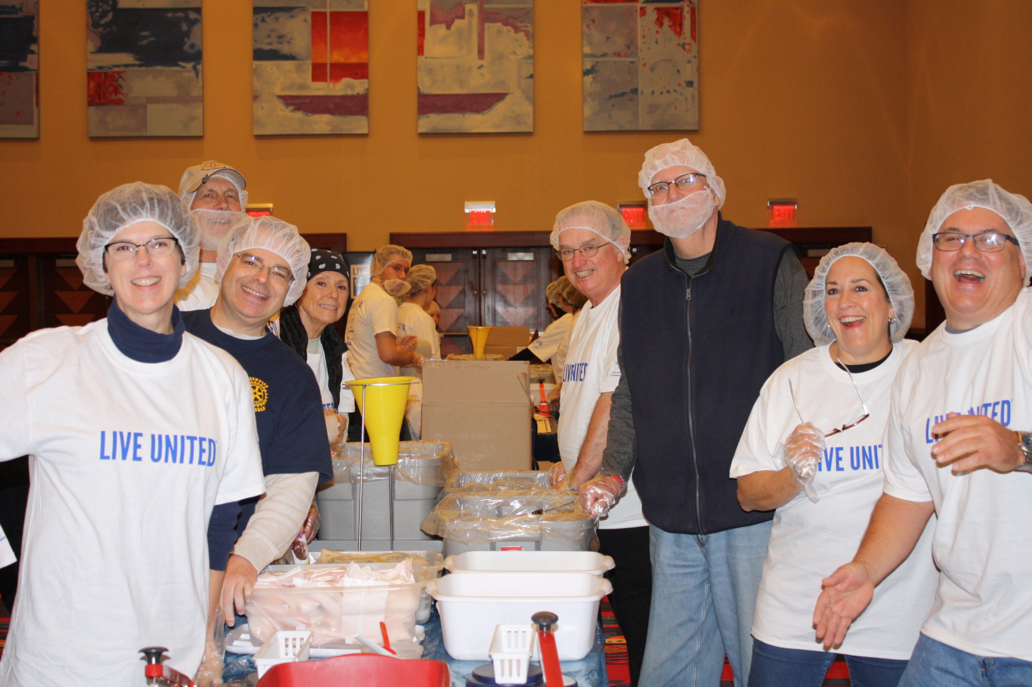 rotarians at meal packing event